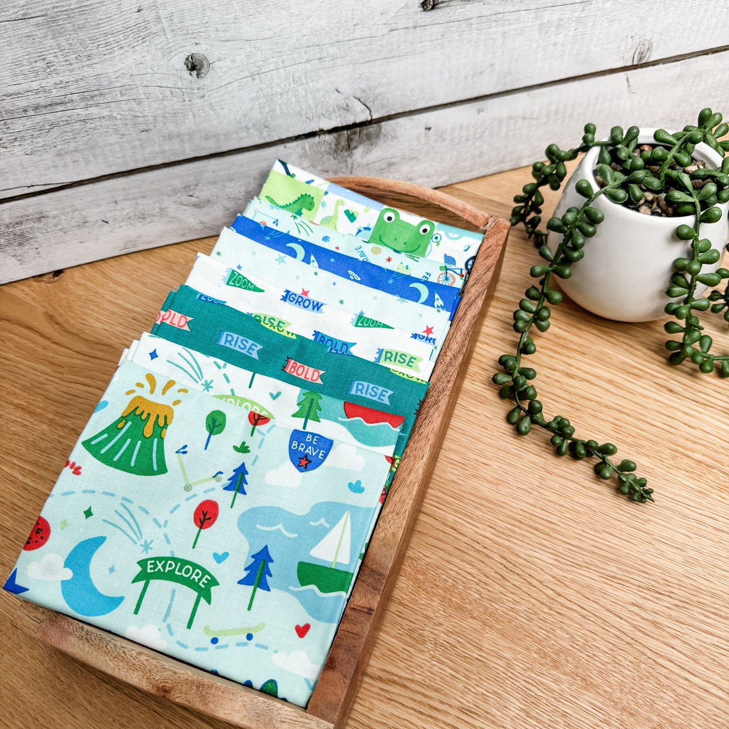 Eight-piece Brave Your Way petite fat quarter bundle featuring the Mint main print, by Cayla Naylor for Riley Blake Designs.
