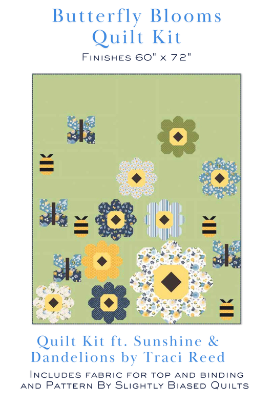 Butterfly Blooms quilt kit with floral and bee pattern on green background