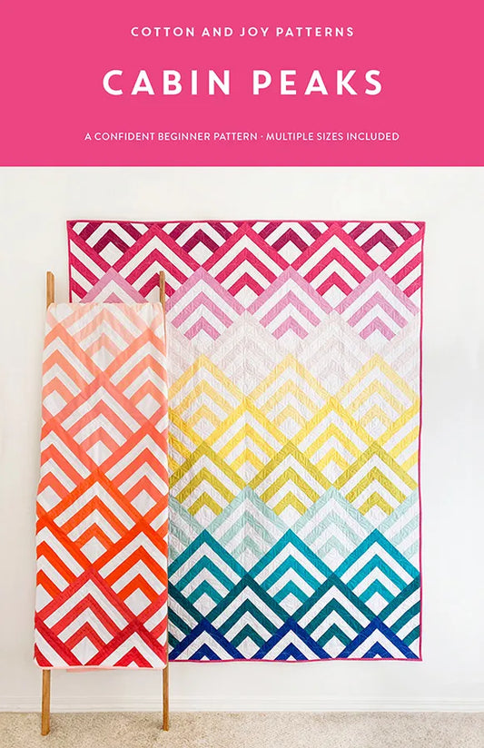 Cabin Peaks quilt pattern cover by Cotton and Joy featuring a modern mountain-inspired quilt design with geometric patchwork blocks.