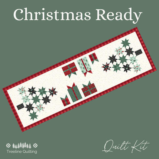 Christmas-themed table runner quilt kit cover featuring a long rectangular quilt design with red gingham borders, green and black star motifs, and gift shapes on a white background, set against a muted green backdrop with the text 'Christmas Ready' and 'Treeline Quilting'. Features the Evergreen Wishes fabric by Traci Reed.