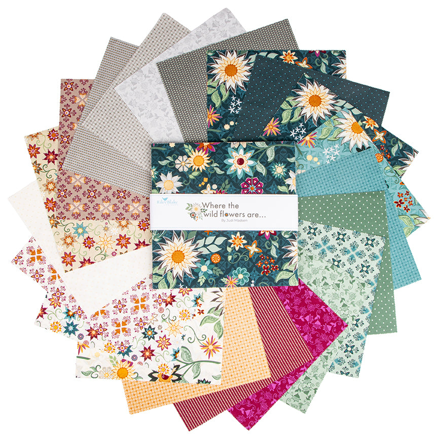 10 inch stacker of fanned out fabrics.  The Where the Wild Flowers are by Judi Madsen. 