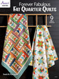 Book cover of 'Forever Fabulous Fat Quarter Quilts' with two colorful quilts on a wooden shelf.
