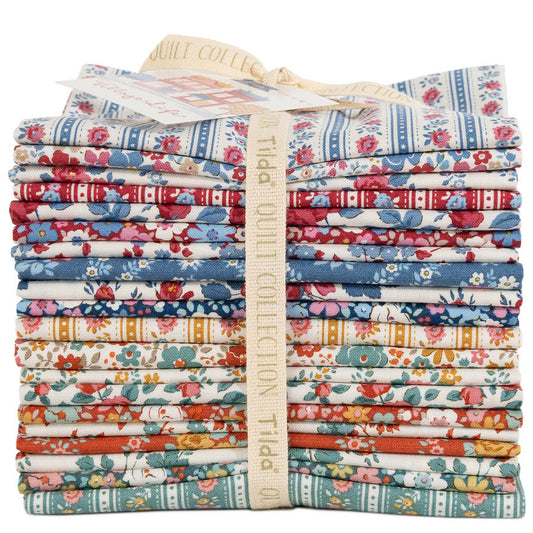 Tilda's Village Life fat quarter bundle.  20 piece stacked and tied with a ribbon.  