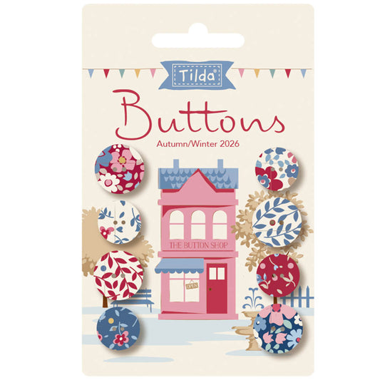 Pack of Tilda buttons with a decorative design on a beige background
