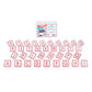 Alphabet and number craft letter tiles arranged on a white background, with their retail packaging box visible in the upper center.