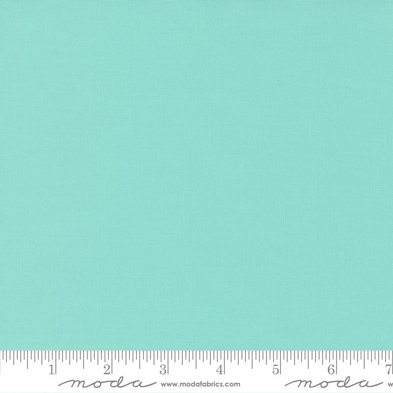 Bella Aqua fabric swatch with ruler