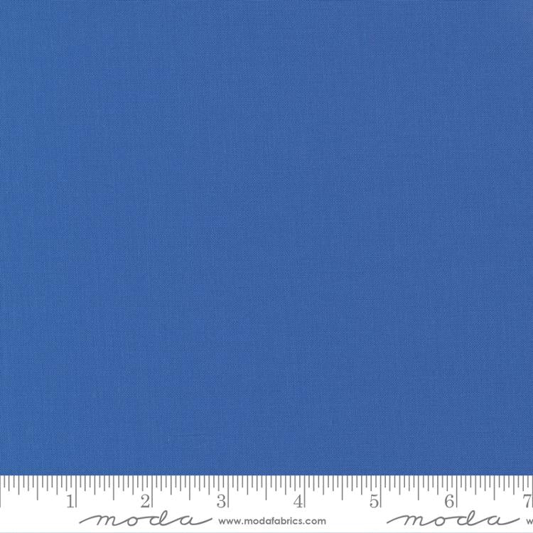 Bella Solid Cobalt Fabric swatch with ruler