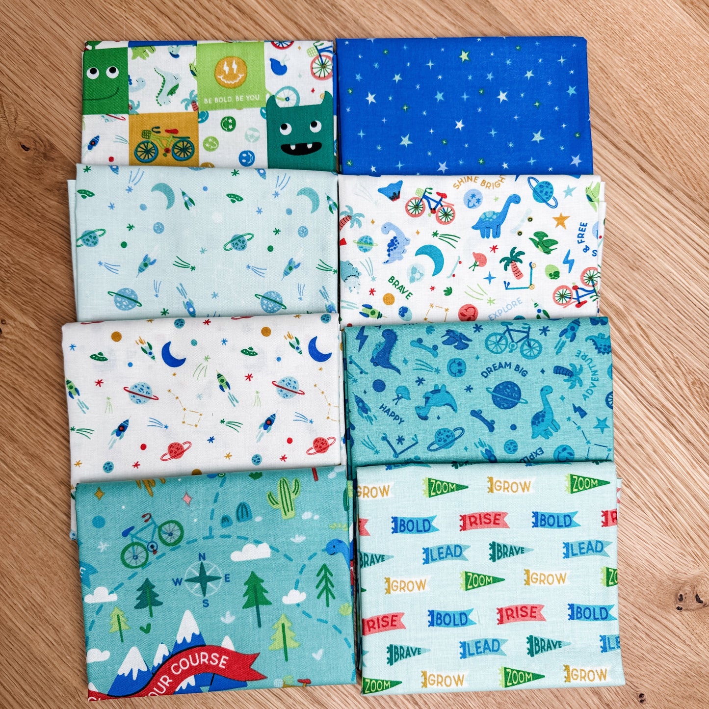 Eight-piece Brave Your Way petite fat quarter bundle featuring the Lagoon main print, by Cayla Naylor for Riley Blake Designs.