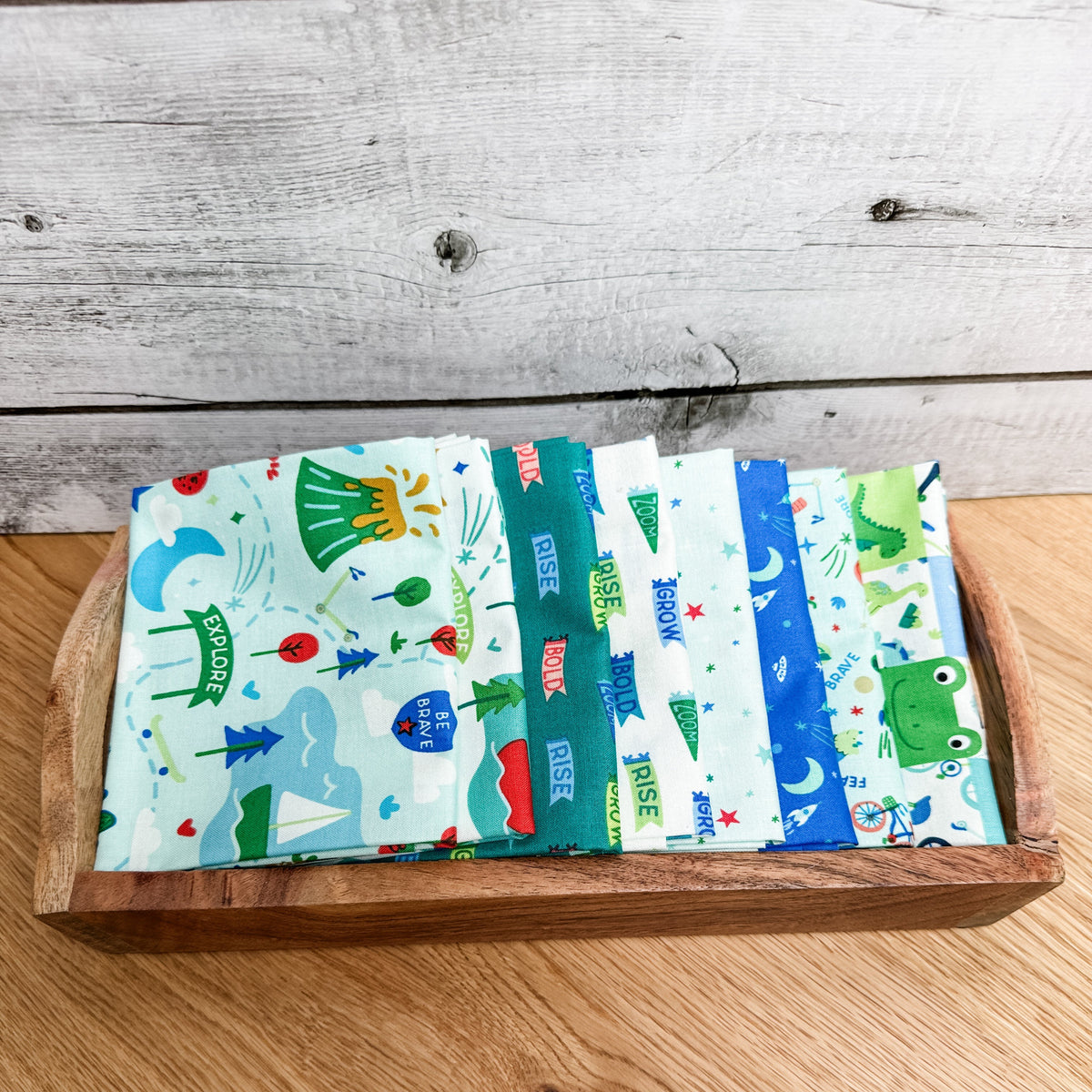 Eight-piece Brave Your Way petite fat quarter bundle featuring the Mint main print, by Cayla Naylor for Riley Blake Designs.
