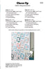 A fabric requirements chart titled 'Cheer Up' showing pattern pieces, yardage needs, and a small printed sample of the fabric design. The layout includes text for Crib, Twin, and Queen sizes, plus a central preview of the printed fabric pattern.