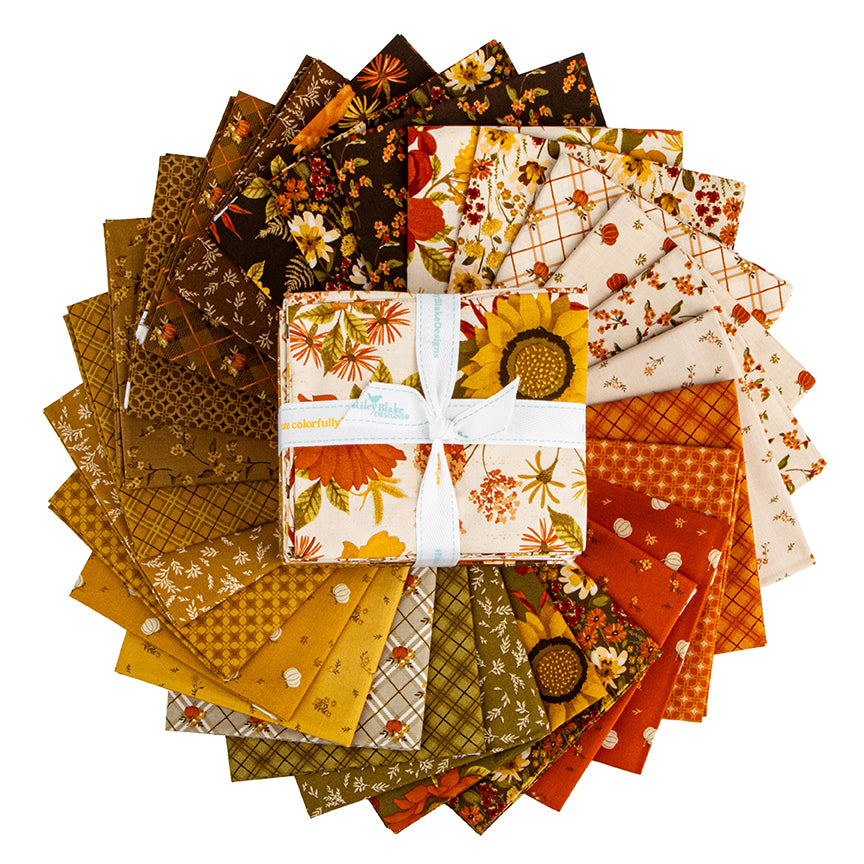 fanned out Bountiful fat quarter bundle with an overlay of a stacked complete bundle.  