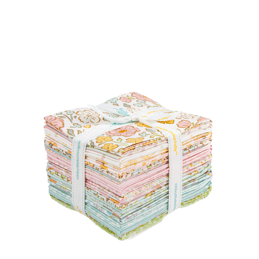 A stack of Little Posies fat quarters  folded quilting fabrics bundled with a white paper band, featuring various pastel floral and botanical patterns in pink, green, yellow, and blue on a white background.