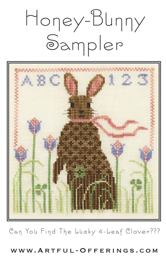 Honey Bunny Sampler cover by artful offerings.  Features a brown bunny among the tulips and grass.  