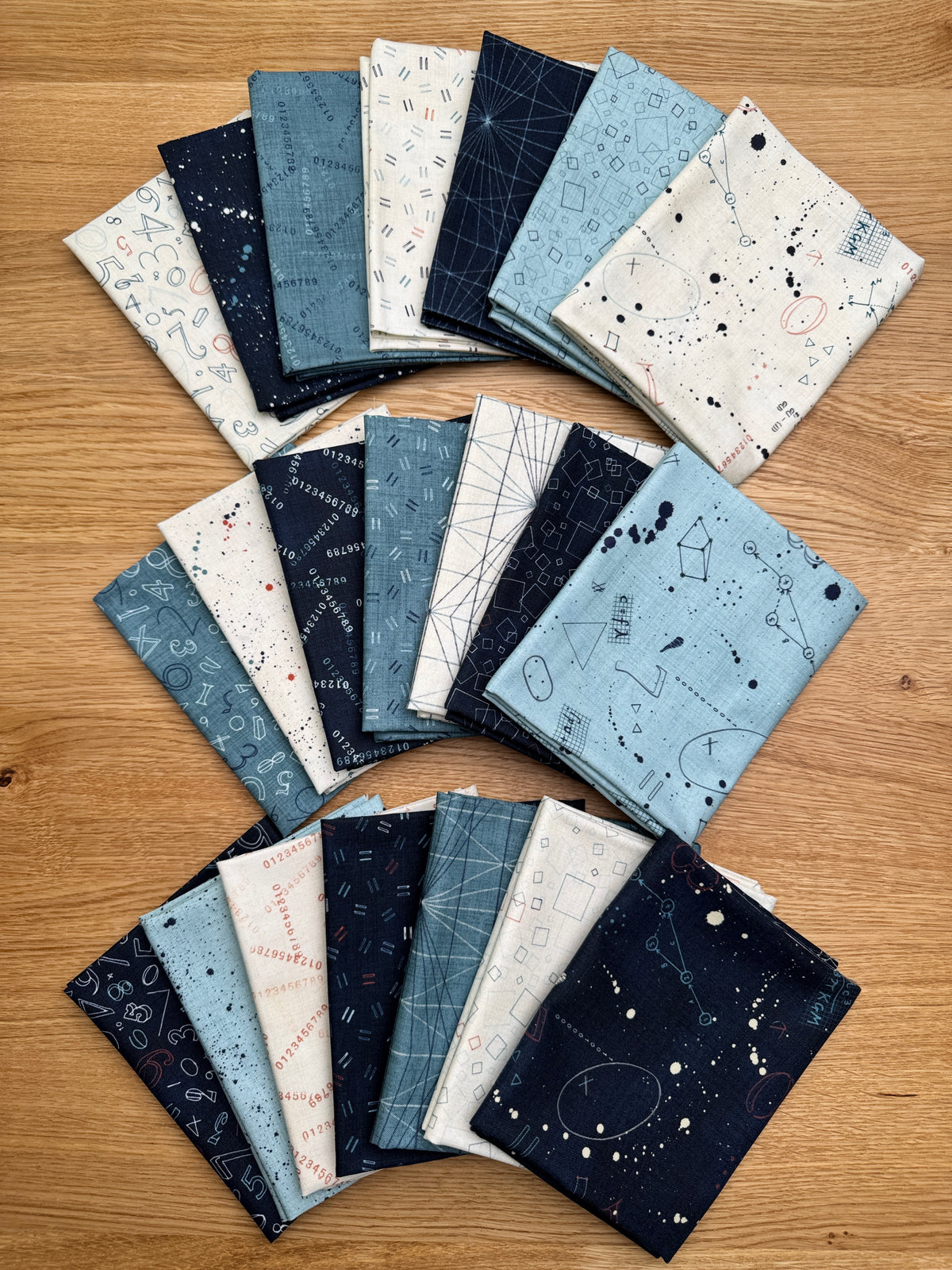 Data fabric collection by Janet Clare.  Three color way petite fat quarter bundles.  