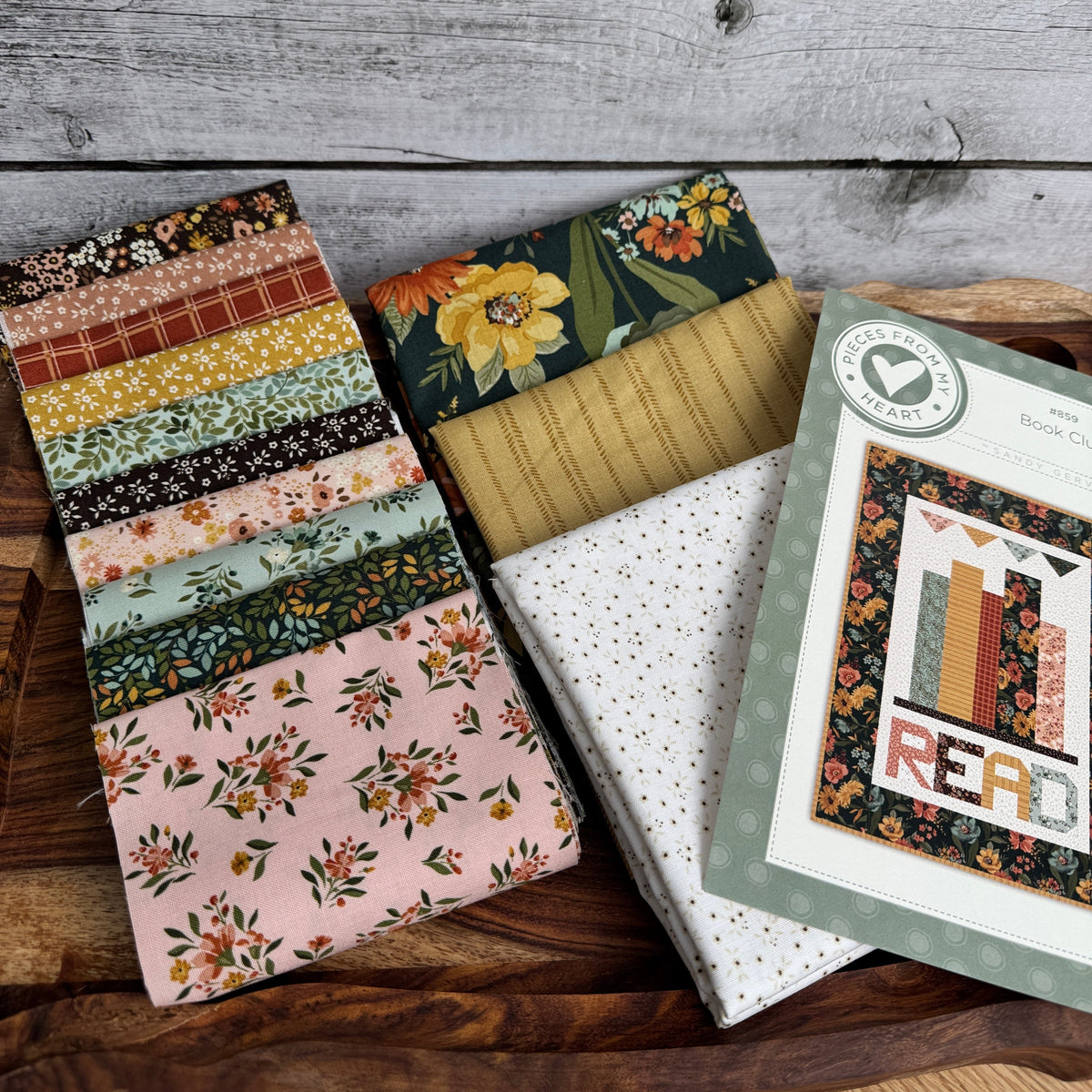 The Book Club pattern and called for fabrics laid on a tray.  Quilt pattern by Sandy Gervais using Worth Repeating fabrics.