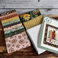 The Book Club pattern and called for fabrics laid on a tray.  Quilt pattern by Sandy Gervais using Worth Repeating fabrics.