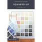 Squared Up quilt pattern cover by Cotton and Joy featuring a modern patchwork quilt made with 10-inch squares in a bold geometric layout.
