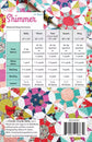 A sewing pattern cover page titled "Shimmer" showing a size and yardage chart for baby, throw, twin, queen, and king sizes. The page includes a colorful patchwork quilt pattern preview, fabric yardage requirements, construction details, and a barcode with the Cluck Cluck Sew brand.