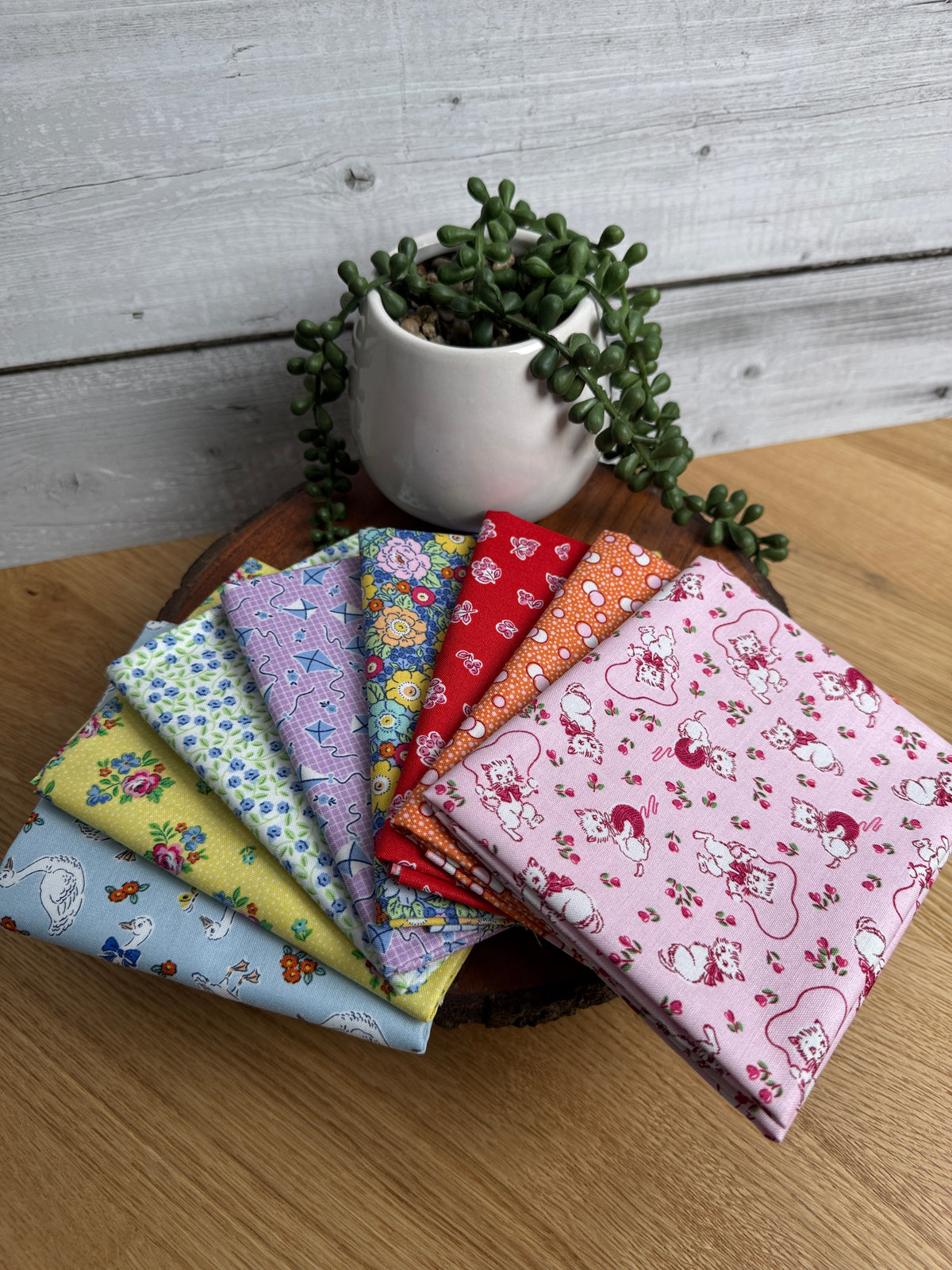 Eight-piece Traditional 30's petite fat quarter bundle by Lindsay Wilkes for Riley Blake Designs.