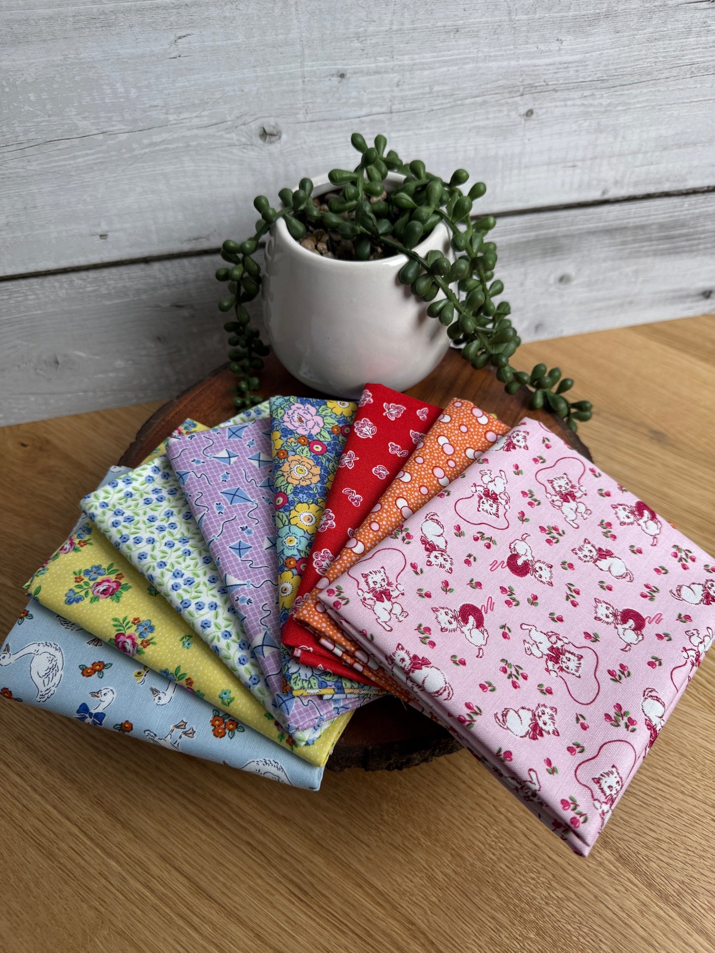 Eight-piece Traditional 30's petite fat quarter bundle by Lindsay Wilkes for Riley Blake Designs.