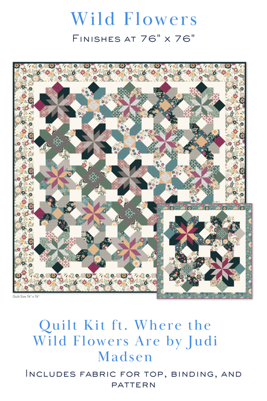 Wild Flowers Quilt Kit featuring floral fabrics from the Where the Wild Flowers Are collection by Judi Madsen for Riley Blake Designs. Includes the pattern, quilt top, and binding. 